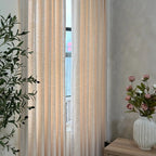 Light filtering test of Vanilla Cream Jasper Dotted Linen Blend Curtains showing 45% to 65% blackout effect