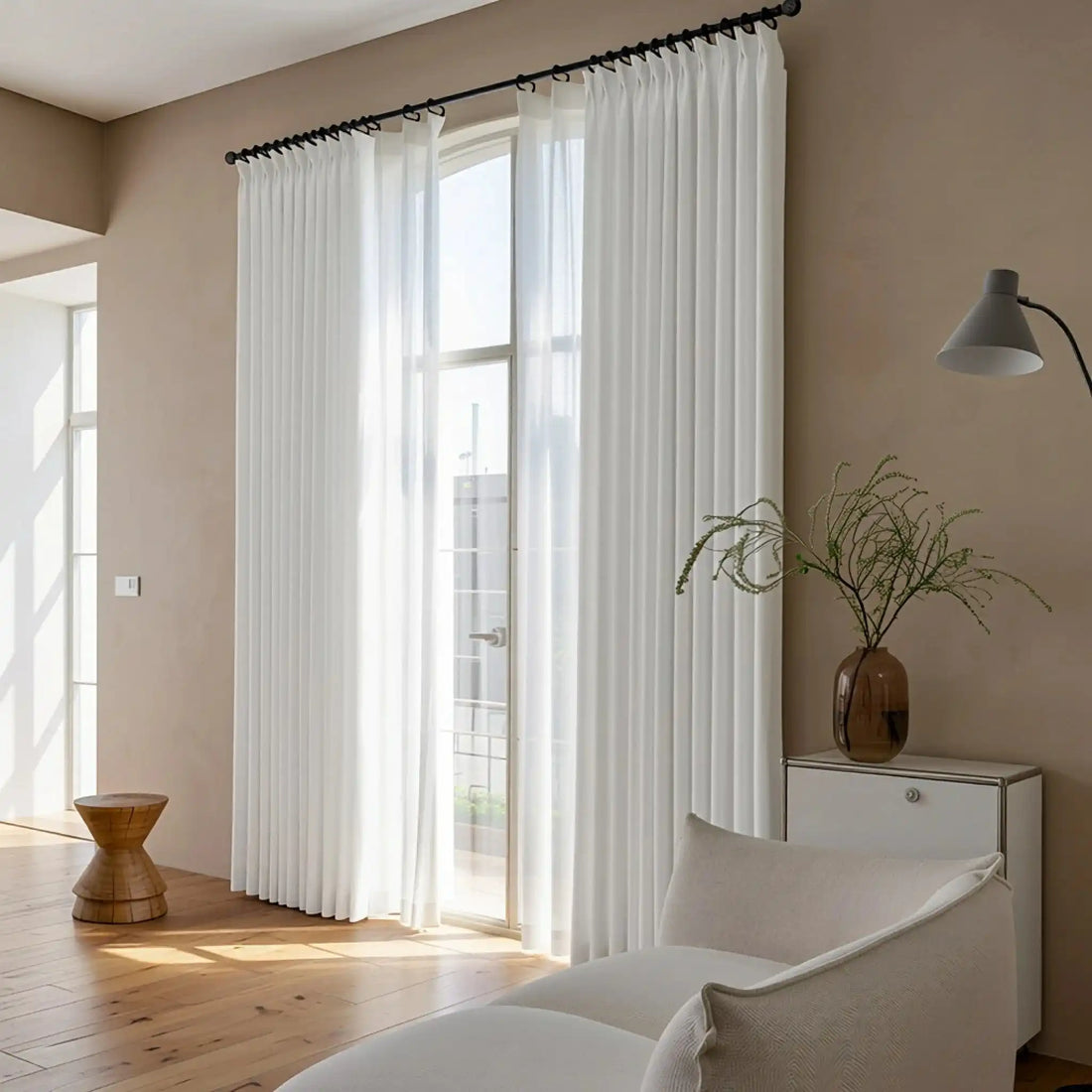 White John Linen Texture Cotton Curtains paired with minimalist decor on a tall arched glass door