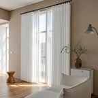 White John Linen Texture Cotton Curtains paired with minimalist decor on a tall arched glass door