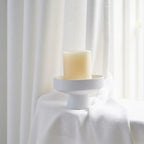 White John Linen Texture Cotton Curtains draped elegantly behind a minimal candle holder setup