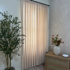 Jasper Dotted Linen Blend Curtains in Vanilla Cream with black curtain rod, bedroom window decor