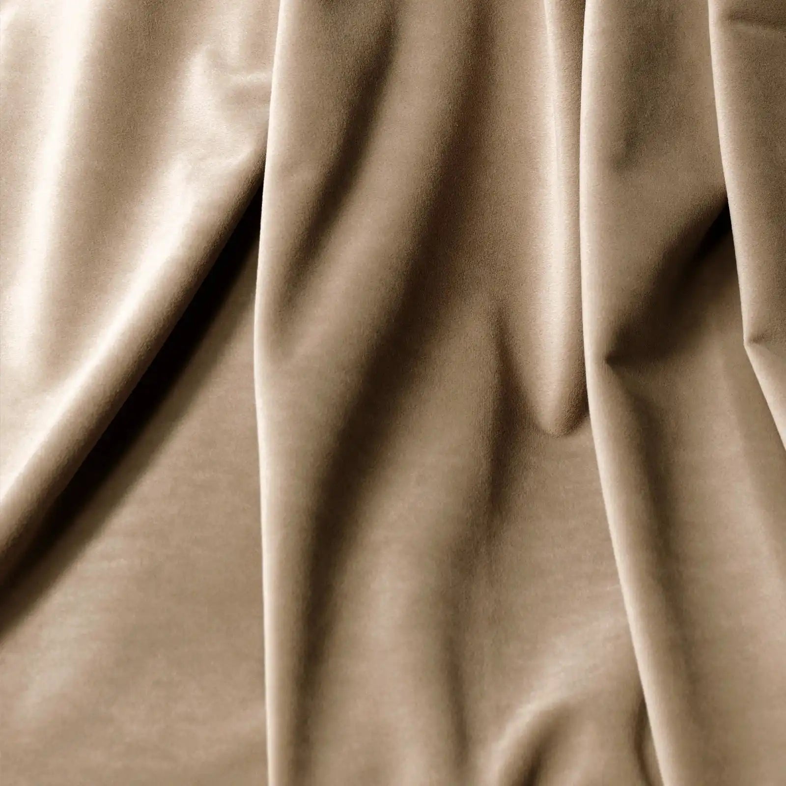 An extreme close-up photograph of the textured surface of Adrian Cashmere Blackout Curtains fabric in a warm Camel Yellow color, showcasing its soft, plush weave.