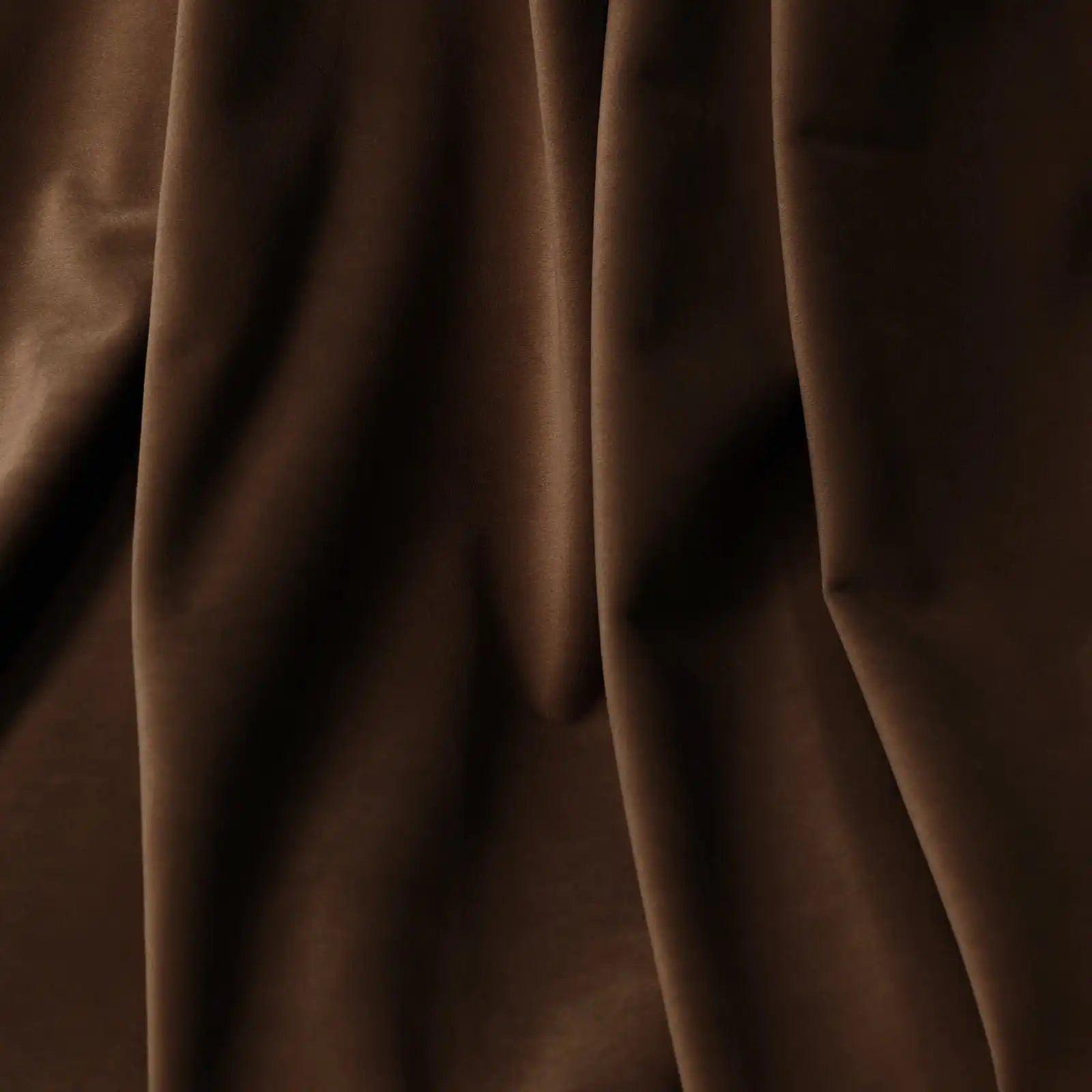 A detailed close-up of the deep brown material folding naturally, highlighting its ultra-soft, velvet-like texture and subtle matte finish.
