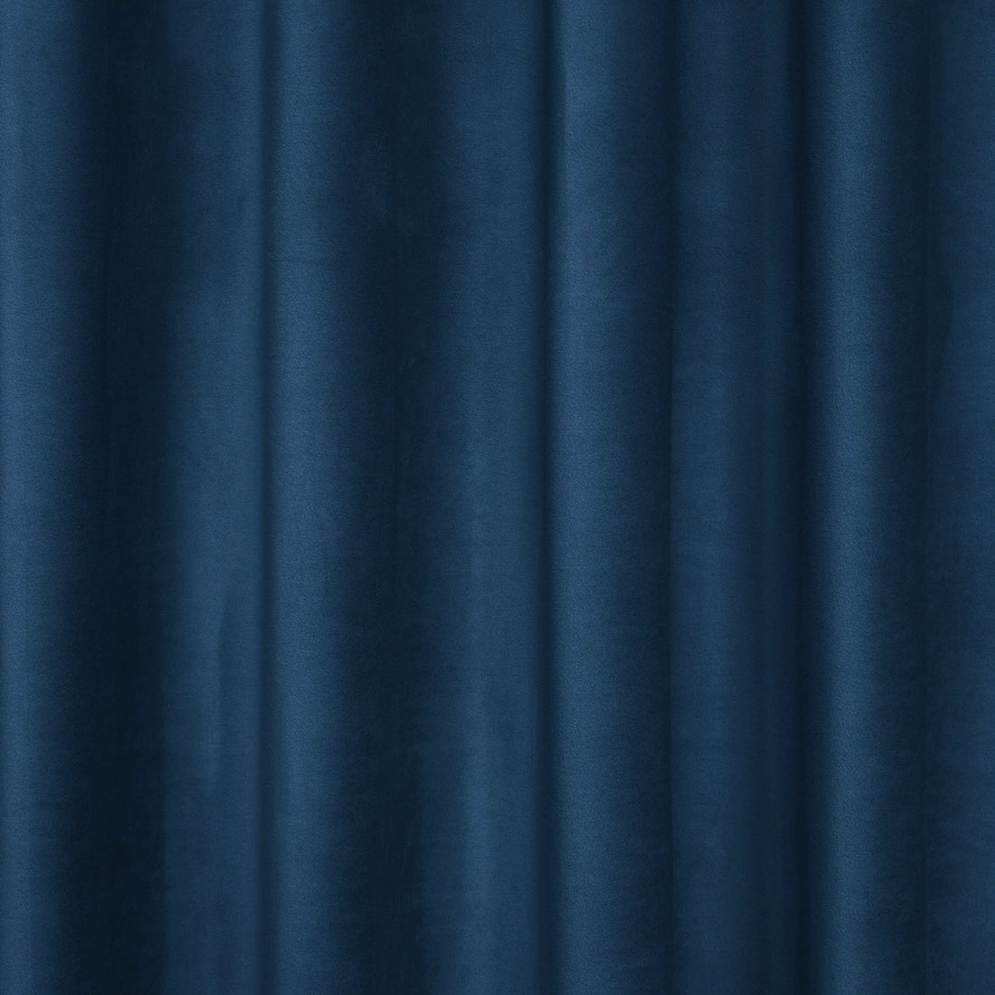 A tight, vertical shot showcasing the uniform, crisp pleats and structured vertical folds of the deep sea blue curtain fabric as it hangs.