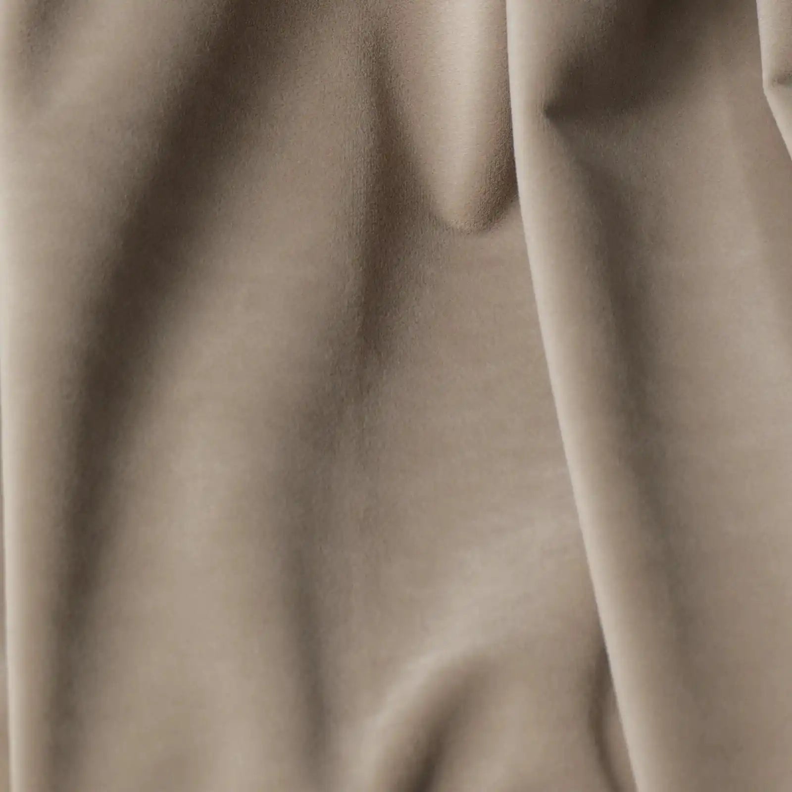 A macro close-up photograph capturing the fine, velvet-like texture and soft, luxurious fibers of the Adrian Cashmere Blackout Curtain fabric in Light Gray-Brown.