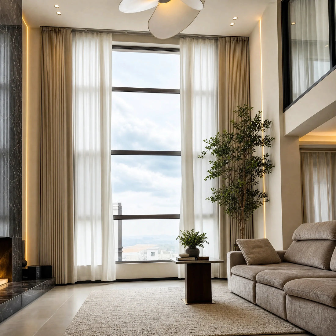 Beige Alex 100% blackout curtains with white sheers on tall modern living room windows