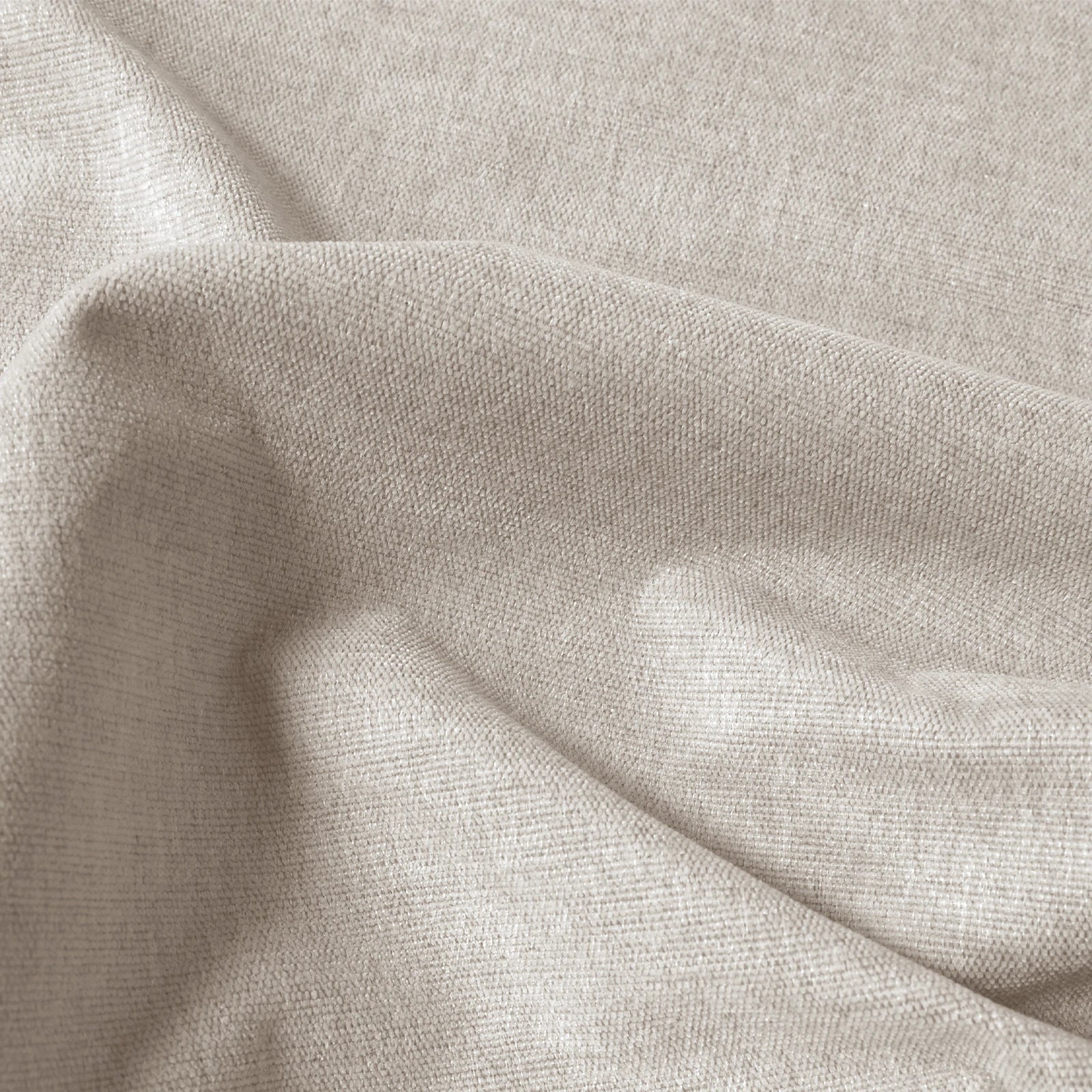 Close-up of beige Alex blackout curtain fabric with textured linen-look weave