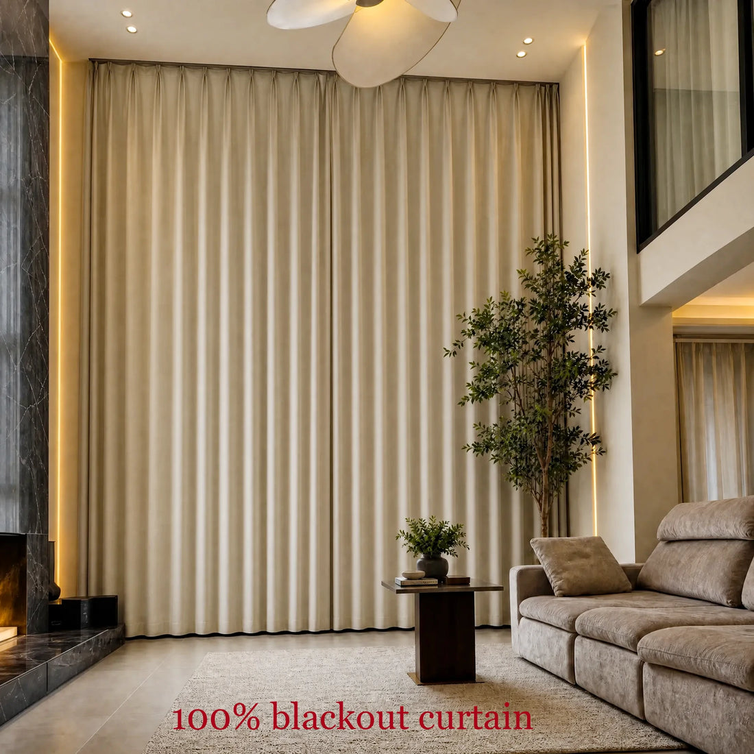 Fully closed beige Alex blackout curtains covering floor-to-ceiling living room windows
