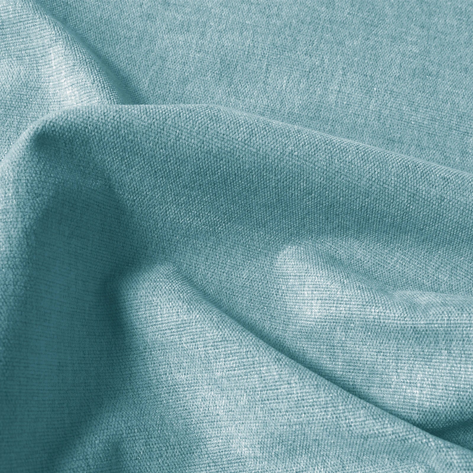 Close-up of light green Alex blackout curtain fabric with fine linen-look texture