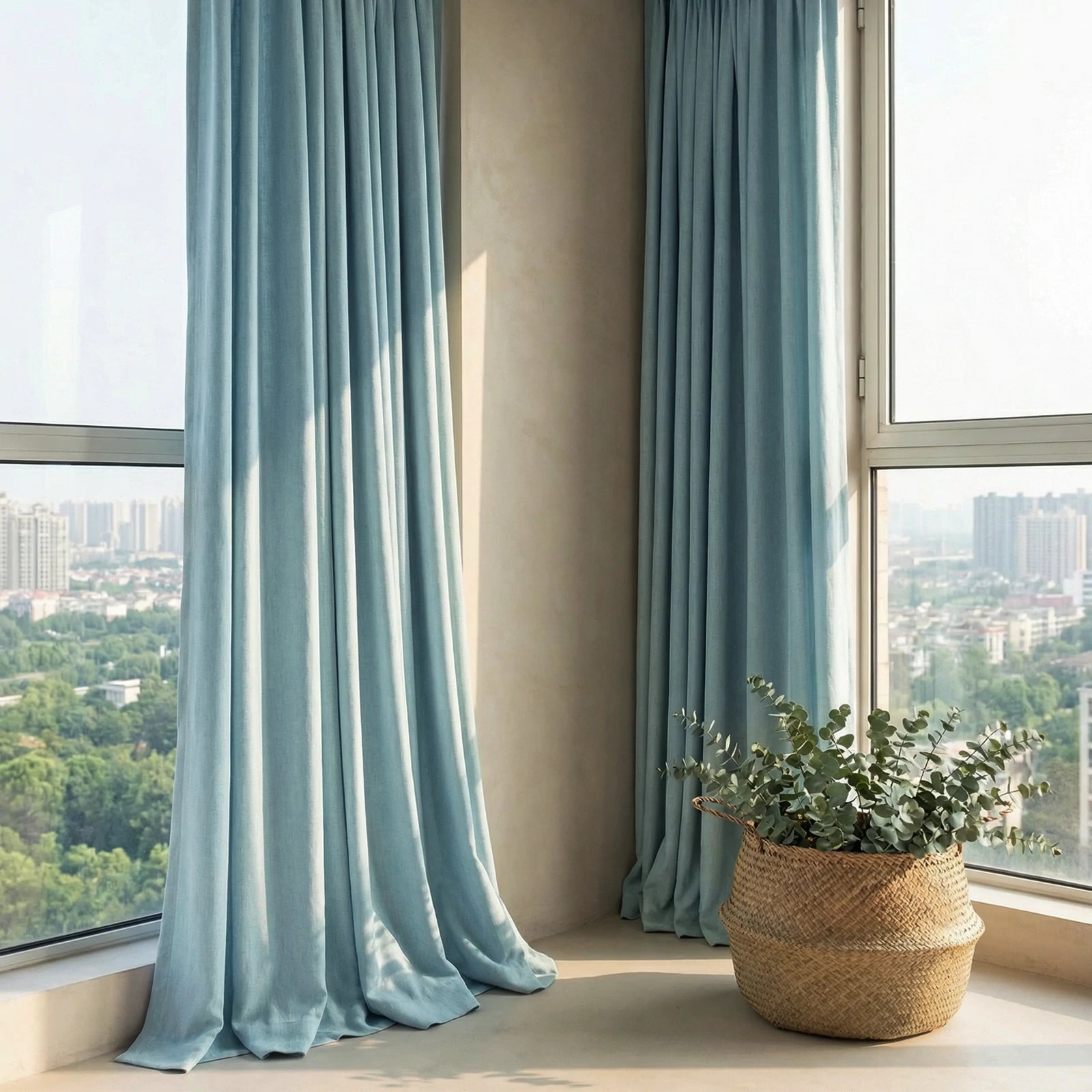 Tall light green Alex curtains adding soft color to a spacious contemporary lobby