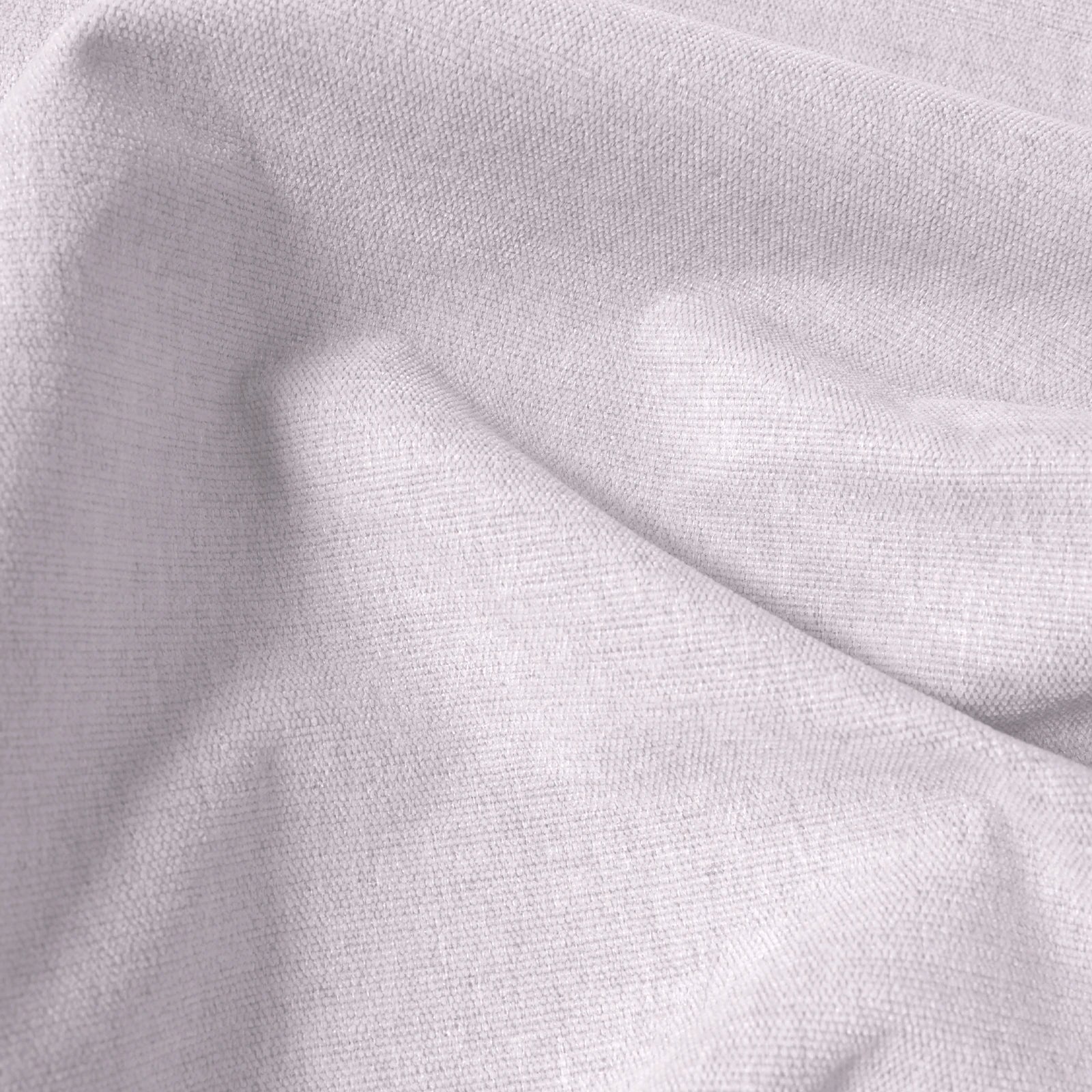 Macro view of light pink Alex blackout curtain fabric and fine woven texture