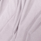 Light pink Alex curtain fabric arranged in soft folds for a linen-look finish