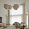 Ayla Weave Extra Long Sheer Curtains are installed in a huge floor-to-ceiling window.