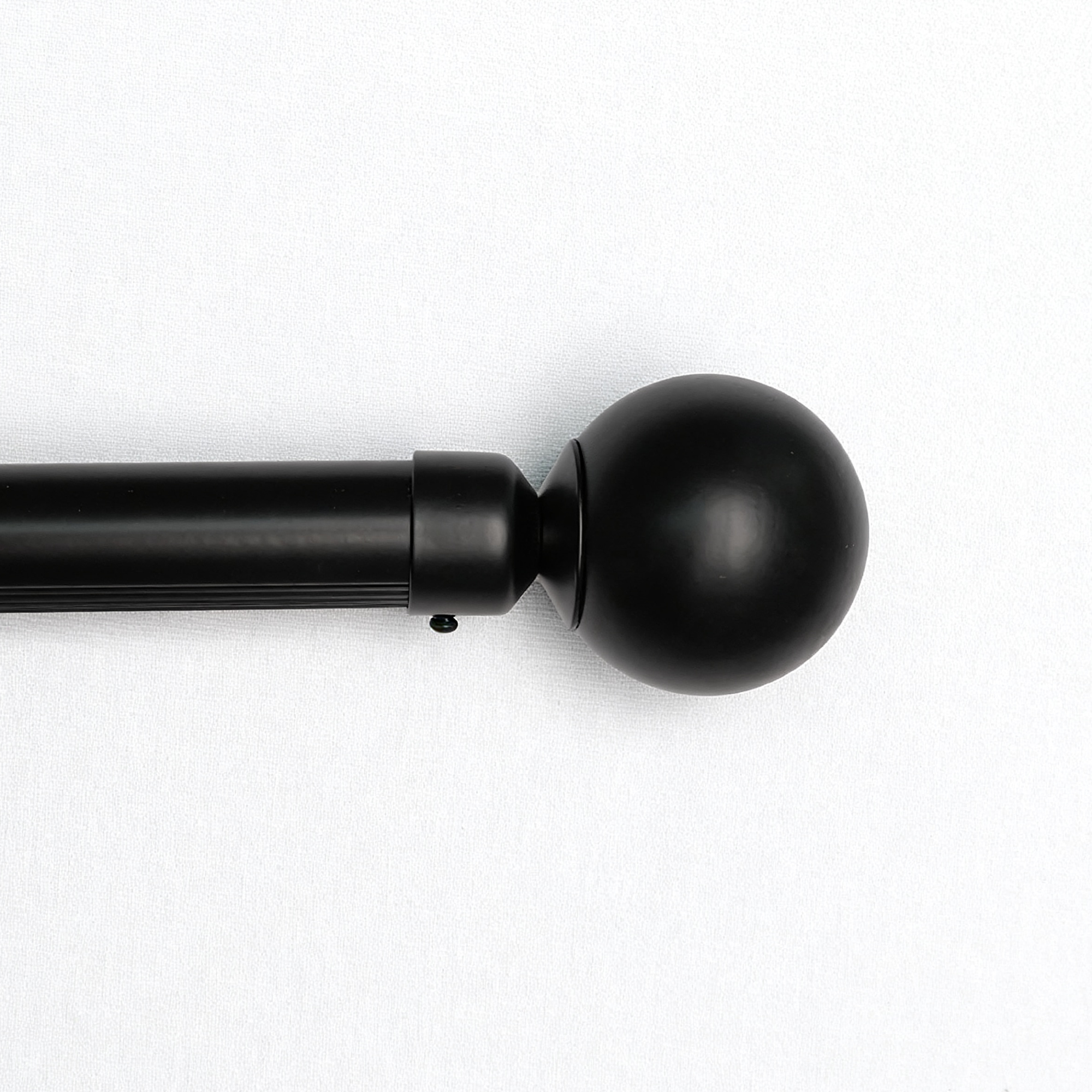 Black spherical curtain rod finial