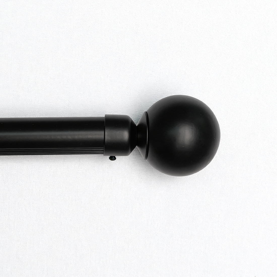 Black spherical curtain rod finial