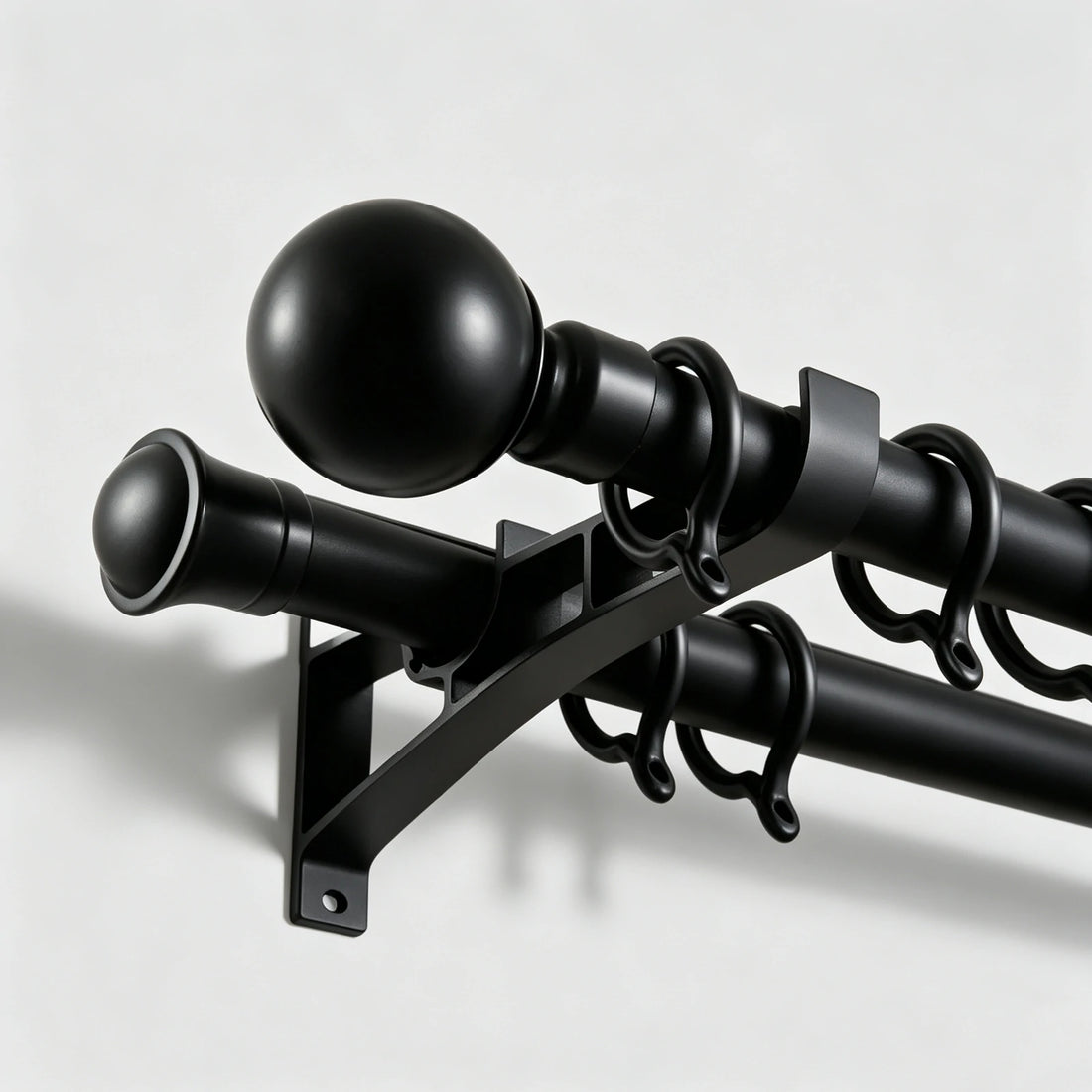 Heavy duty Black Bieber Custom Curtain Rod installation detail showing matte black finish close up