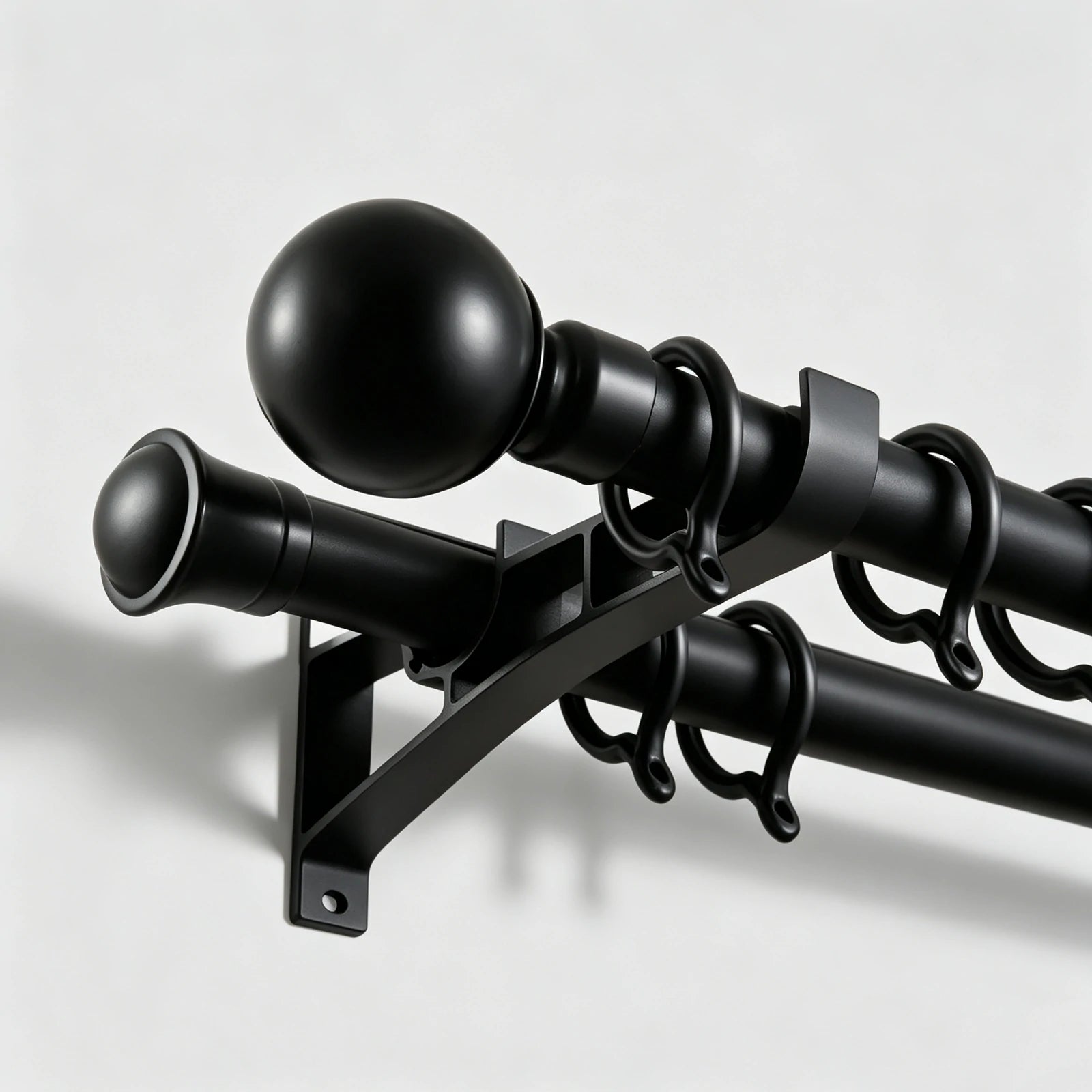 Heavy duty Black Bieber Custom Curtain Rod installation detail showing matte black finish close up