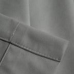 Close-up of cool gray Gavin curtain texture and tailored hem