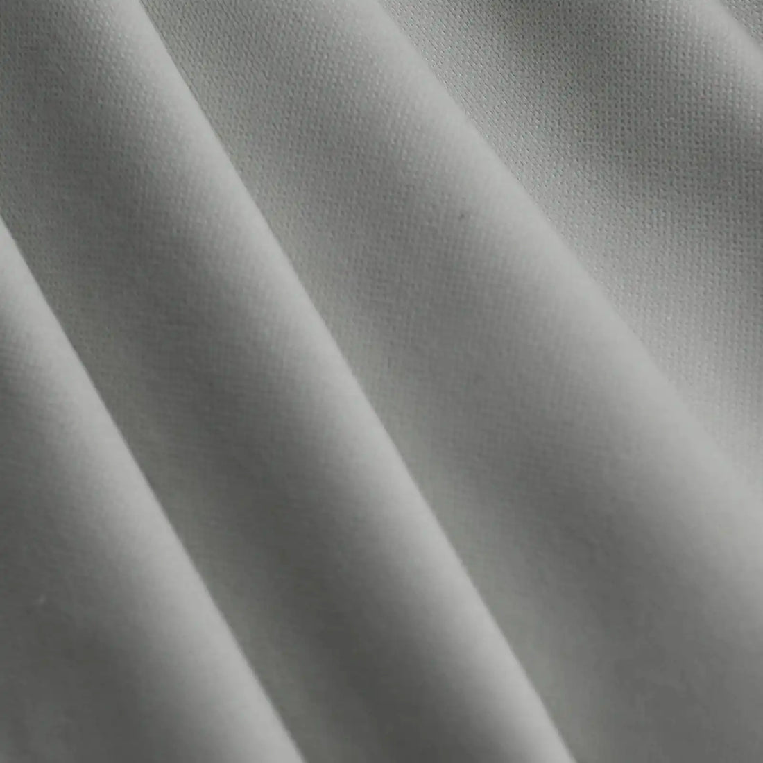 Cool gray Gavin curtain panel showing smooth drape and woven texture