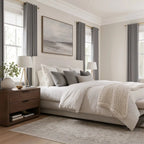 Cool gray Gavin curtains styled across three windows in a modern bedroom