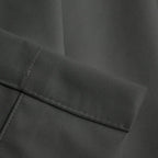 Close-up of dark gray Gavin curtain texture and tailored hem