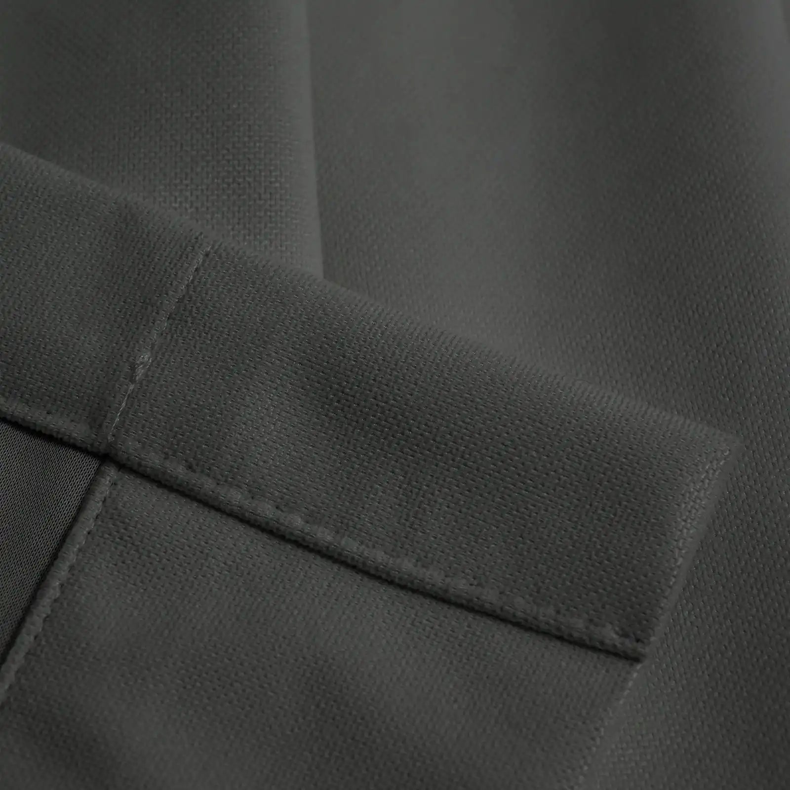 Close-up of dark gray Gavin curtain texture and tailored hem