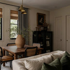 Overhead view of a neutral bedroom with dark gray Gavin window curtains