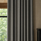 Dark gray Gavin curtains with soft pleats in a calm contemporary bedroom