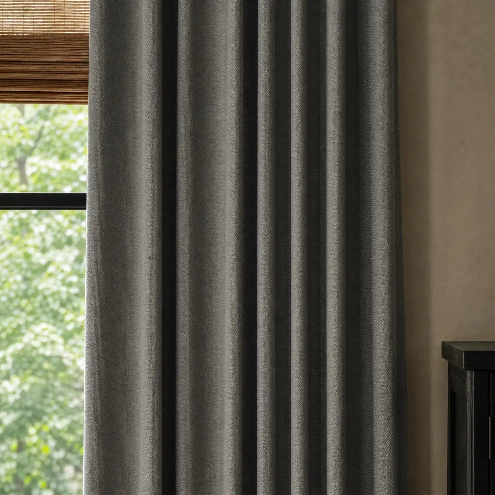 Dark gray Gavin curtains with soft pleats in a calm contemporary bedroom