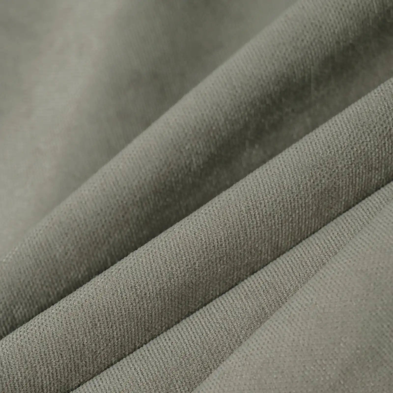 Macro detail of gray brown Gavin curtain fabric arranged in soft folds