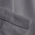 Close-up of purplish gray Gavin curtain texture and tailored hem