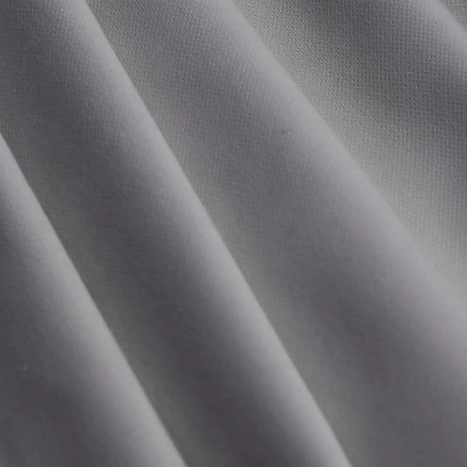 Purplish gray Gavin curtain panel showing smooth drape and woven texture