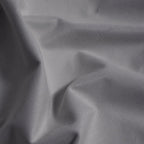 Macro detail of purplish gray Gavin curtain fabric arranged in soft folds