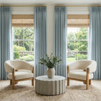 Blue Gray John Linen Texture Cotton Curtains styled alongside woven bamboo shades in a bright symmetric sitting room