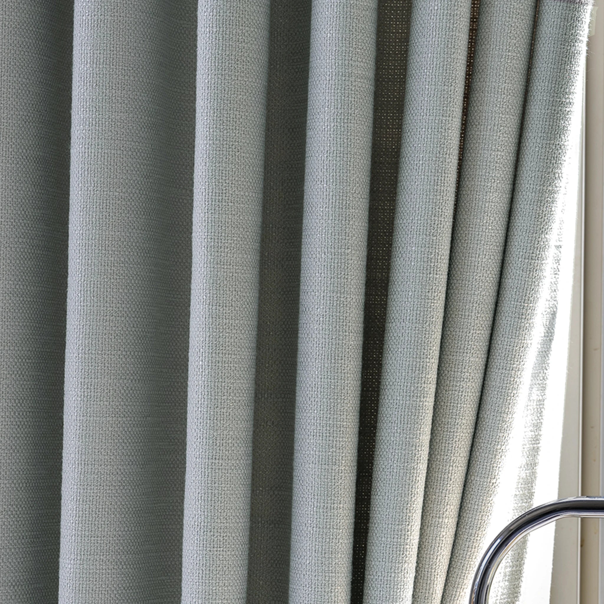 Pleat fold detail and organic cotton fabric weave of Gray John Linen Texture Cotton Curtains under natural light