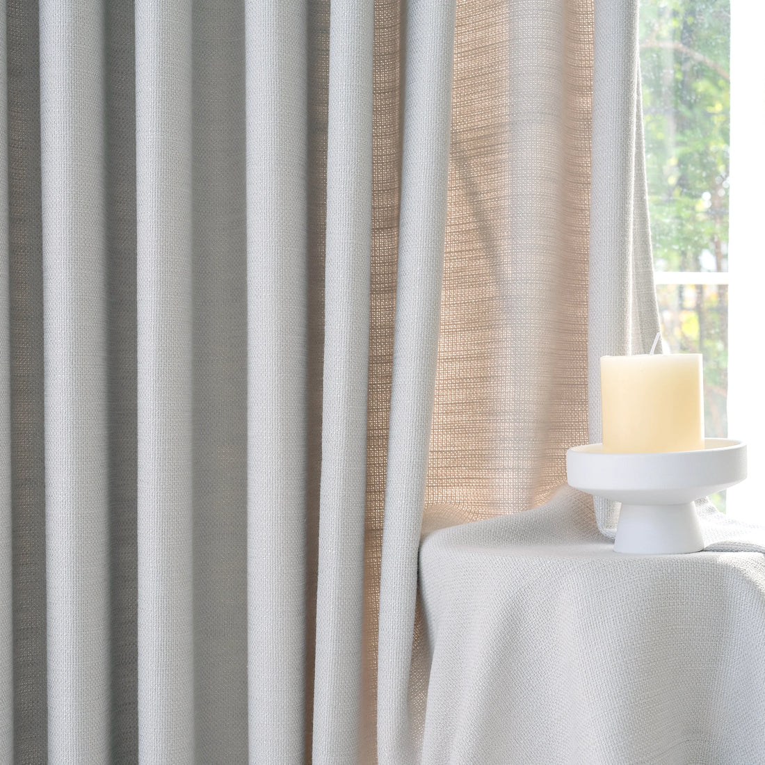 Close up material texture of Light Gray John Linen Texture Cotton Curtains catching bright natural light
