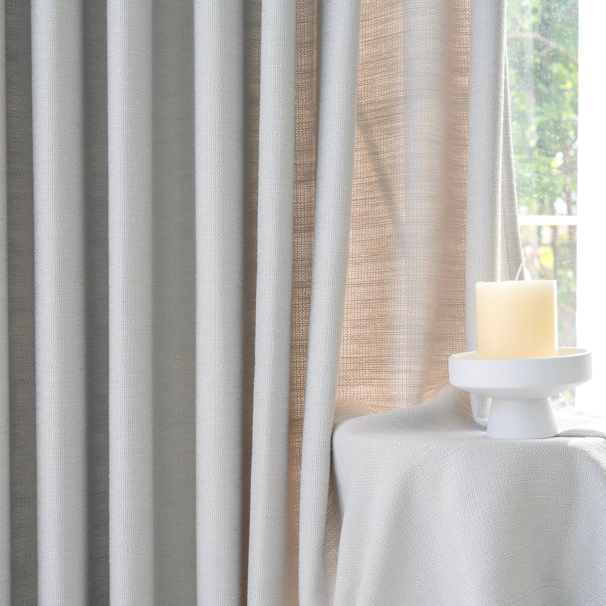 Close up material texture of Light Gray John Linen Texture Cotton Curtains catching bright natural light