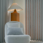Cozy room design featuring Light Gray John Linen Texture Cotton Curtains next to a stylish boucle chair