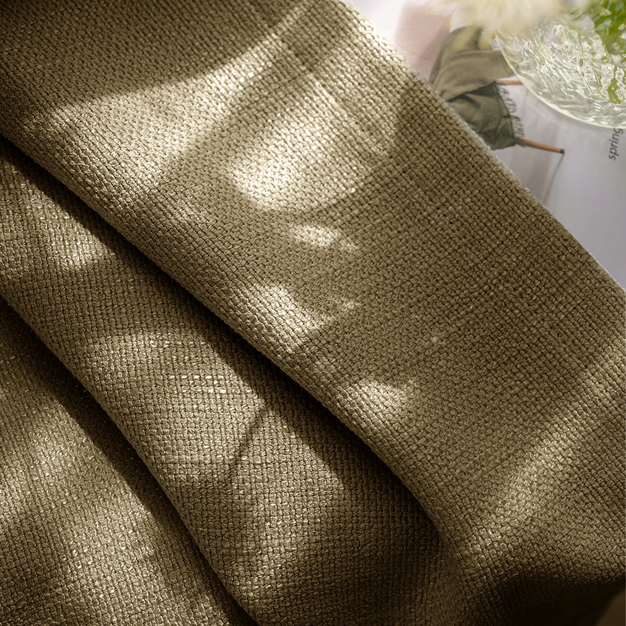 Close up material shot of Sage Green John Linen Texture Cotton Curtains highlighting the natural textured weave