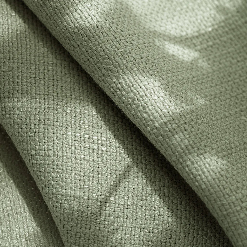 Detailed textile background showing the organic fibers and premium tailoring of Grass Green John Linen Texture Cotton Curtains