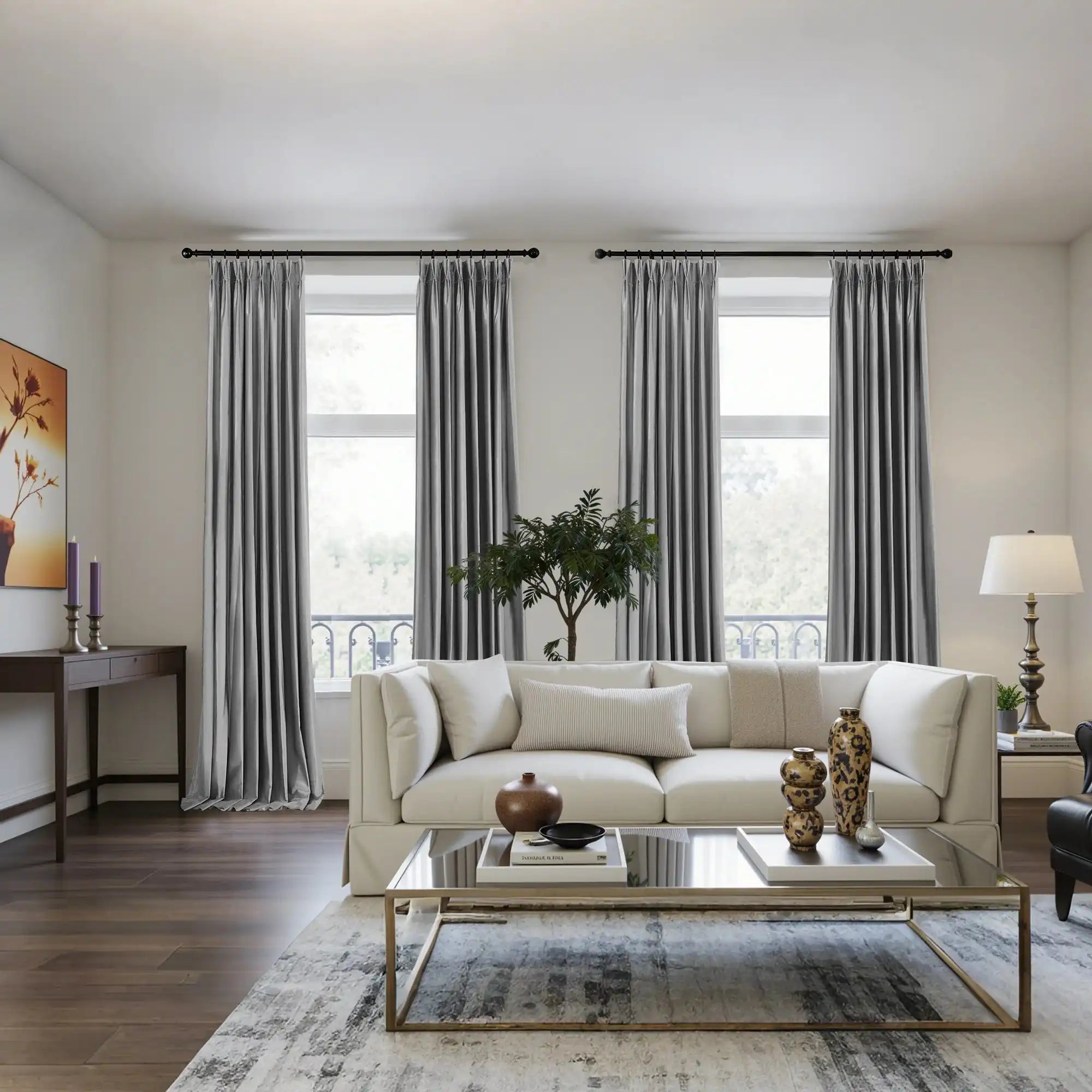 Elegant living room with light gray velvet curtains hanging on black curtain rods, large windows, white walls, and modern decor.