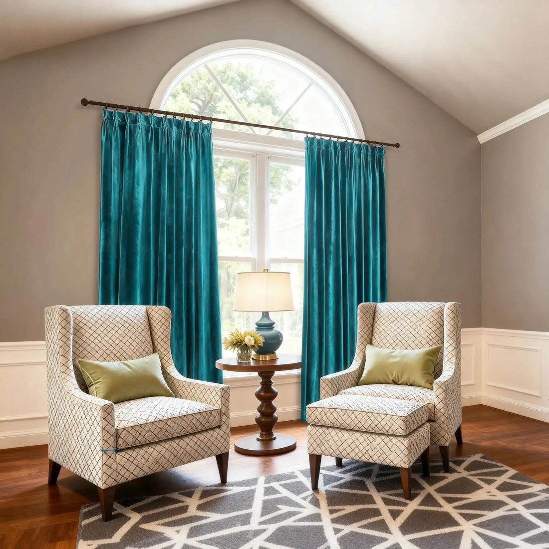 Elegant teal velvet curtains with a smooth, luxurious texture hanging in front of a large window, perfect for upscale interior decor.
