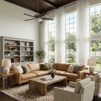 Grand high ceiling lounge showcasing extra long White Lisa Semi Sheer Curtains with a cognac leather sectional