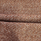 A close-up view of the multi-tonal caramel and white curtain fabric, neatly pressed into a horizontal fold across the middle to showcase its clean drape and uniform texture.