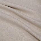 A soft, full-frame shot of the light yellow curtain material arranged in fluid diagonal folds, showcasing its rich tactile quality and light-catching weave.