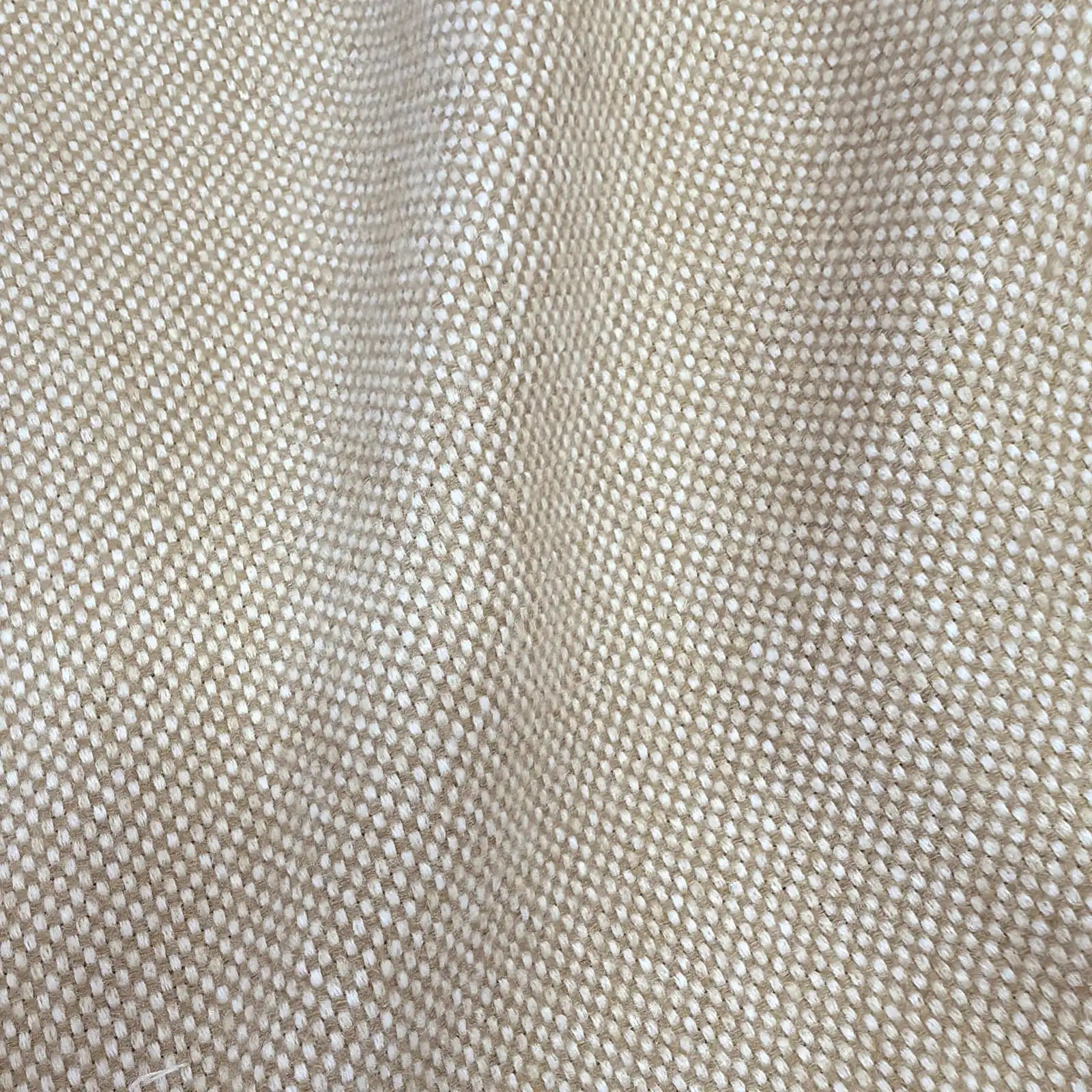 A close-up texture shot of the light yellow-tan woven fabric draped in smooth, diagonal waves, showcasing the material's soft luster, clean drape, and consistent basketweave pattern.