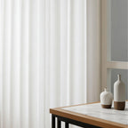 Contemporary home interior styling with vertical waves of White Sarah Semi Sheer Curtains and modern vases