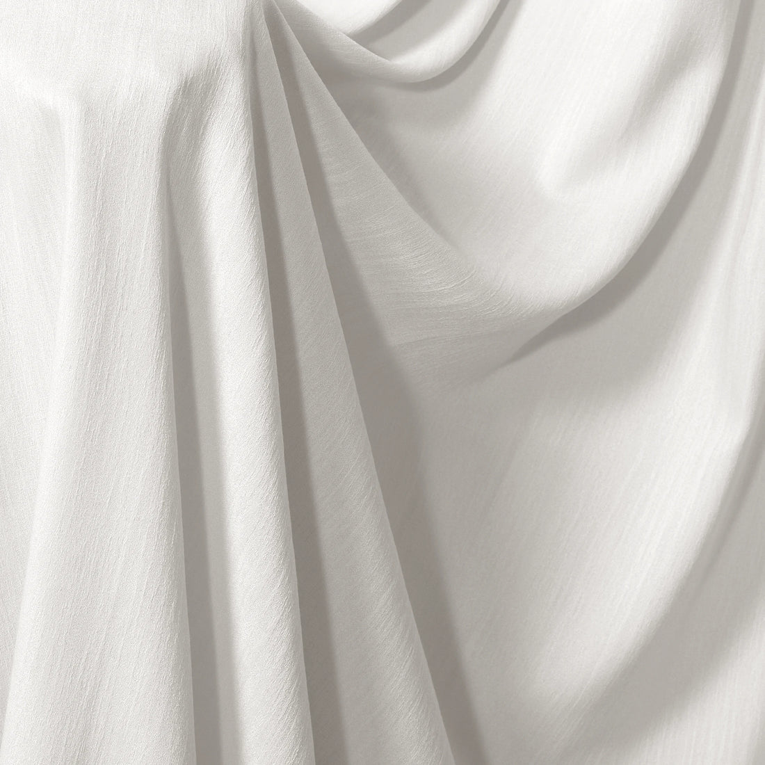 Close up textured material of luxury White Sarah Semi Sheer Curtains showing delicate fabric weave