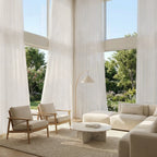 Luxury floor to ceiling Beige Sarah Semi Sheer Curtains in a bright mid century modern living room