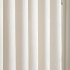 Detailed vertical fabric weave of luxury Beige Sarah Semi Sheer Curtains hanging in a bedroom